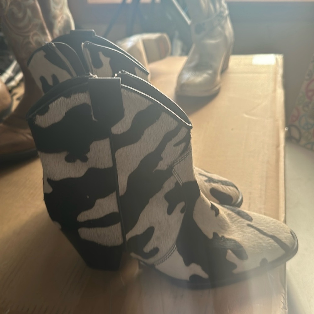 Cow print cowboy boots. - purchased at a. Boutique In Nashville